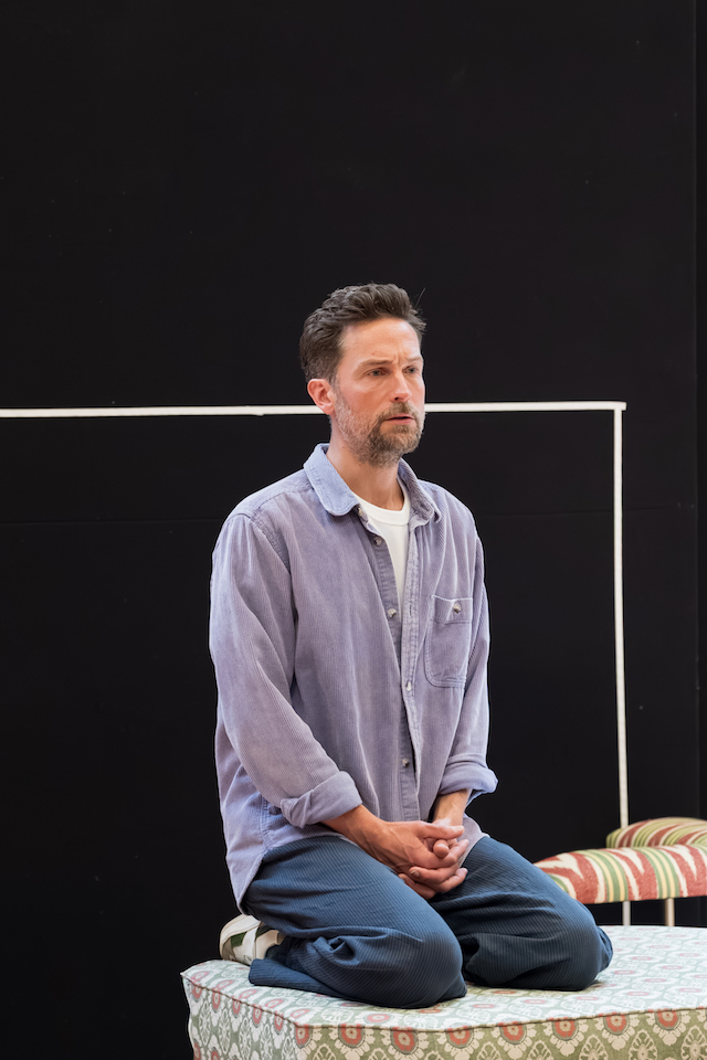 Rehearsal photo with Tom kneeling